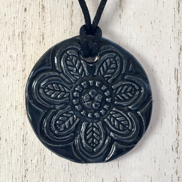 black flower pendant