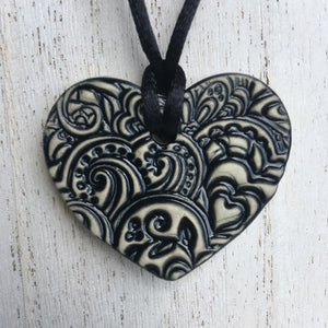 swirly heart pendant